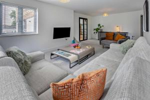 a living room with two couches and a tv at 4 Bed in Wadebridge oc-l30127 in Wadebridge