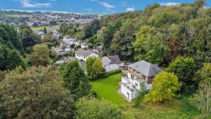 an aerial view of a house on a hill at 4 Bed in Wadebridge oc-l30127 in Wadebridge