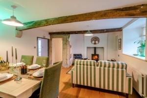 a dining room with a table and chairs at 3 Bed in Caldbeck oc-h30704 in Caldbeck
