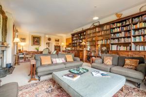 a living room with two couches and bookshelves at 5 Bed in Battle oc-c31779 in Battle