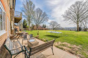 a bench sitting on the side of a house with a yard at 5 Bed in Battle oc-c31779 in Battle