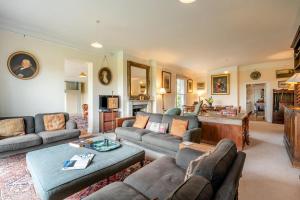 a living room with a couch and a table at 5 Bed in Battle oc-c31779 in Battle