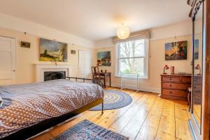 a bedroom with a bed and a fireplace at 5 Bed in Battle oc-c31779 in Battle