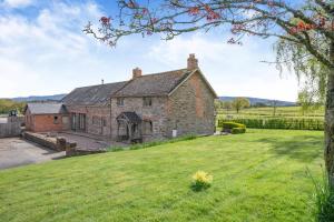an old stone house with a large yard at 6 Bed in Llanwern oc-w31947 in Brecon