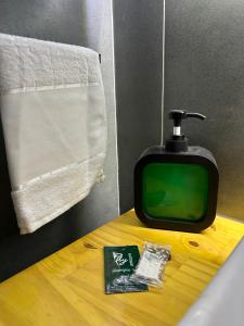 a small television sitting on a table in a room at Vibe Amazon in Manaus