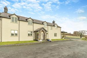 a large white house with a road in front of it at 5 Bed in Devils Bridge oc-t13712 in Devils Bridge