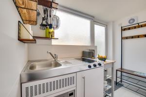 a kitchen with a sink and a window at 1 Bed in Saltdean oc-bbidre in Saltdean +11 photos