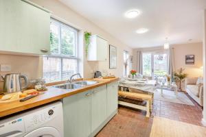 a kitchen with a sink and a dishwasher at 2 Bed in Aspatria oc-p32645 in Aspatria +8 photos