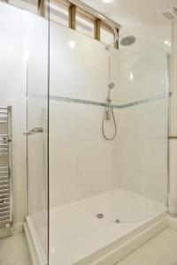 a shower with a glass door in a bathroom at 2 Bed in Yoxford oc-hharro in Yoxford +6 photos