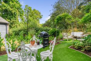 a patio with a table and chairs and a grill at 2 Bed in Dedham oc-c32543 in Dedham +17 photos