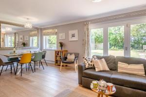 a living room with a couch and a table at 3 Bed in Westleton oc-egv in Westleton
