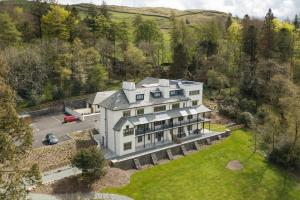 an aerial view of a house in the hills at 2 Bed in Windermere oc-gl064 in Windermere