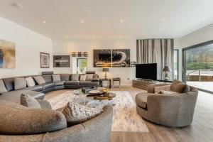 a living room with two couches and a tv at 5 Bed in St. Fillans oc-t30058 in Saint Fillans