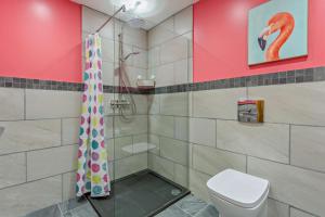 a bathroom with a shower and a toilet at 1 Bed in Strathpeffer oc-h30077 in Strathpeffer