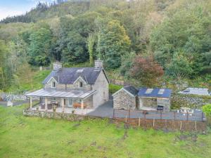 an aerial view of a house in a field at 2 Bed in Penmaenpool oc-m30050 in Arthog