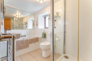 a bathroom with a toilet and a shower at 3 Bed in Isle Of Skye oc-r31786 in Broadford +21 photos