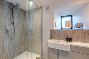 a bathroom with a shower and a sink at 1 Bed in Austwick oc-b31906 in Horton in Ribblesdale +10 photos