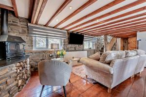 a living room with a couch and a fireplace at 2 Bed in Port Talbot oc-b30705 in Port Talbot