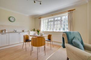 a kitchen and living room with a table and chairs at 1 Bed in Tenterden oc-tn623 in Saint Michaels