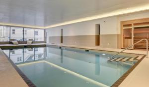 a large swimming pool in a building at 3 Bed in Woolacombe oc-5byron in Woolacombe