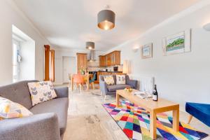 a living room with a couch and a table at 2 Bed in Marazion oc-p00598 in Marazion