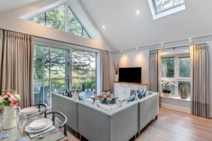 a large living room with a couch and a tv at 2 Bed in Padstow oc-t29016 in Padstow