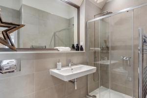 a bathroom with a sink and a shower at 2 Bed in Padstow oc-t29016 in Padstow +17 photos