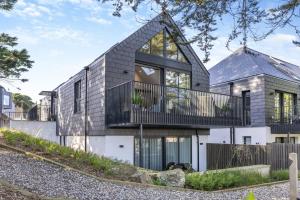 a contemporary house with a gambrel roof at 2 Bed in Padstow oc-t29016 in Padstow