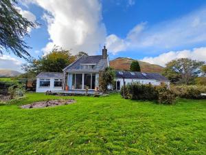 a house with a green lawn in front of it at 3 Bed in Loweswater oc-w30224 in Loweswater +18 photos