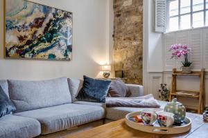 a living room with a couch and a table at 4 Bed in Alnwick oc-g32272 in Alnwick
