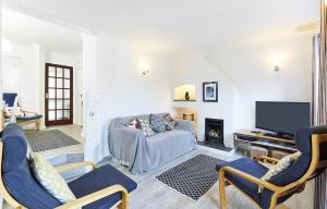 a living room with a couch and a tv at 2 Bed in St. Ives oc-p00693 in Carbis Bay