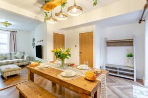 a living room with a table and a couch at 2 Bed in Knaresborough oc-w31758 in Knaresborough