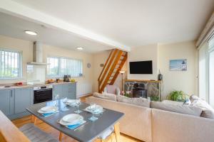 a living room with a couch and a table at 2 Bed in Abersoch oc-c31969 in Abersoch