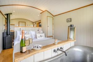 a bedroom with a bed and a bath tub at 1 Bed in Bronllys oc-t31950 in Bronllys