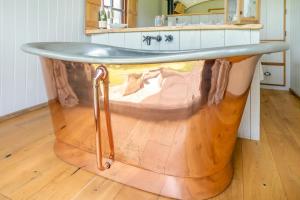 a wooden sink in a kitchen with a wooden floor at 1 Bed in Bronllys oc-t31950 in Bronllys