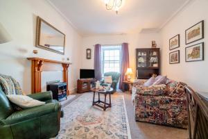 a living room with a couch and a table at 2 Bed in Moffat oc-a32121 in Moffat