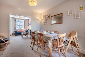 a dining room with a table and chairs at 2 Bed in Langton Matravers oc-d28351 in Langton Matravers