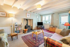 a living room with a couch and a table at 2 Bed in Hawes oc-b30521 in Hardraw