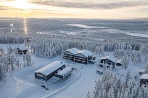 an aerial view of a ski lodge in the snow at Fjällen Aurora Luxe Chalet Ski-in Ski-out by Aavalevi in Levi