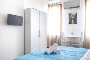 Posteľ alebo postele v izbe v ubytovaní Inlaguna