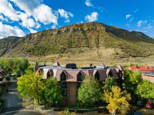 a building with a mountain in the background at Club Wyndham Durango in Durango