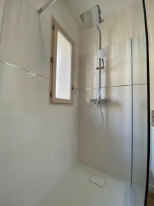 a bathroom with a shower and a window at Le Cocon de Langes in Orange +30 photos