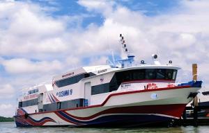 a ferry boat is docked in the water at GiliTicket fast ferries in Padangbai