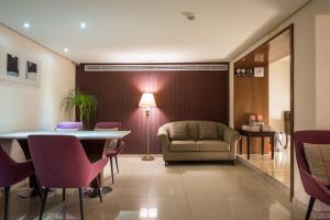 Χώρος καθιστικού στο Delight Hotel