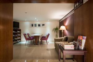 Χώρος καθιστικού στο Delight Hotel
