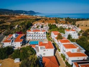 an aerial view of a resort with orange roofs at Greek Village - Latchi הכפר היווני - כשר in Polis Chrysochous