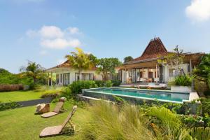 an image of a house with a swimming pool at Villa Utopia in Nusa Lembongan