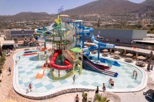 a large water park with a water slide at SunBay Hotel in Hersonissos