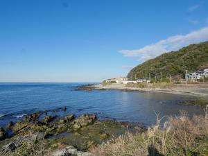 a view of the ocean from the shore at FUNAKATA MINA House in Tateyama +53 photos