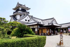 a large building with a pagoda at Comfort Hotel Kochi in Kochi